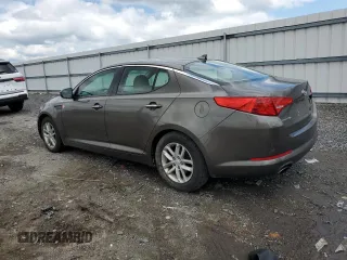 2012 Kia Optima LX z VIN 5XXGM4A72CG051623, wystawiony jako Copart lot #57206105 z przebiegiem 198 442 mil mil oraz Czysty tytuł • Clean title. Historia ofert i sprzedaży dostępna na DreamBid. Obrazek 2.