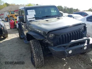 2019 Jeep Wrangler Unlimited Sport Altitude with VIN 1C4HJXDG3KW639148, listed as a IAAI auction lot 41933844 with 57,184 mi miles and . Bid and sale history available at DreamBid. Image 1.