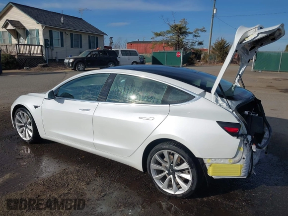2019 Tesla Model 3 Long Range with VIN 5YJ3E1EB7KF442390, listed as a IAAI auction lot 41700122 with 65,539 mi miles. Bid and sale history available at carsss.com. Image 3.