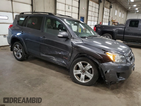 2010 Toyota RAV4 Sport with VIN JTMRK4DV8A5085818, listed as a Copart auction lot 51799295 with 115,109 mi miles and Salvage title. Bid and sale history available at DreamBid. Image 4.
