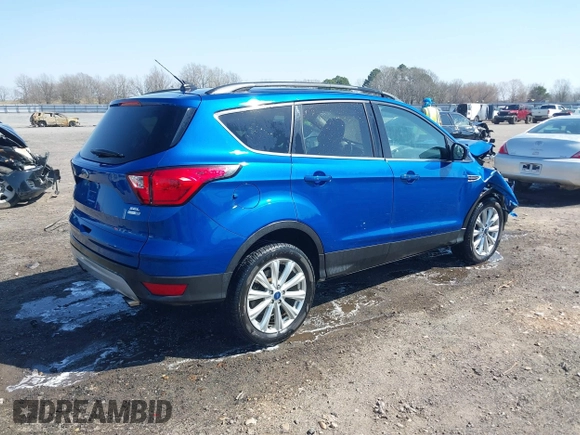 2019 Ford Escape SEL with VIN 1FMCU9HD2KUB52835, listed as a IAAI auction lot 41791321 with 80,468 mi miles and . Bid and sale history available at DreamBid. Image 4.