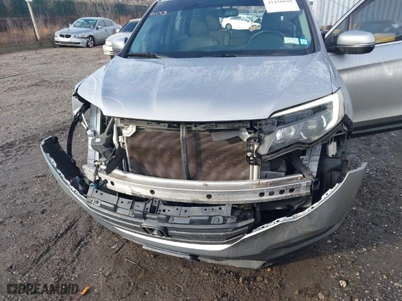 2018 Honda Pilot EX-L with VIN 5FNYF6H59JB026068, listed as a IAAI auction lot 41458049 with 128,769 mi miles. Bid and sale history available at carsss.com. Image 6.