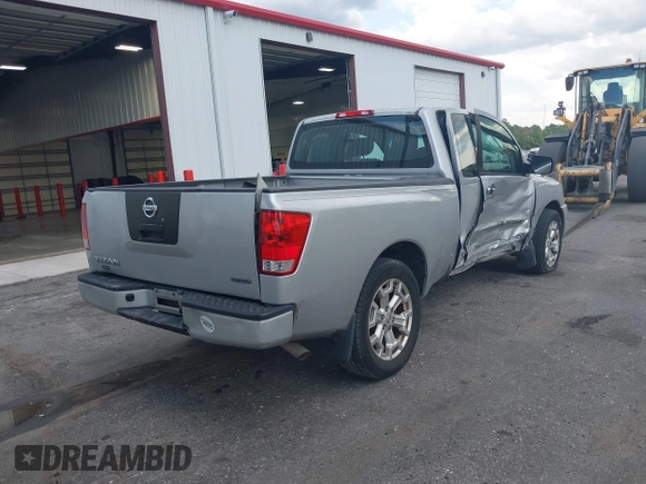 2012 Nissan Titan SE with VIN 1N6BA0CH0CN326229, listed as a IAAI auction lot 41975273 with 106,946 mi miles. Bid and sale history available at carsss.com. Image 4.