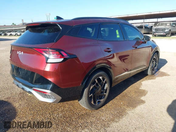 2023 Kia Sportage SX-Prestige with VIN 5XYK53AF4PG114795, listed as a IAAI auction lot 41968650 with 19,880 mi miles and . Bid and sale history available at DreamBid. Image 4.