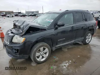 2011 Jeep Compass with VIN 1J4NT1FAXBD138041, listed as a Copart auction lot 87870855 with 184,549 mi miles and Clean Title. Bid and sale history available at carsss.com. Image 1.