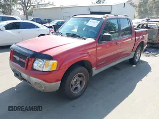 2002 Ford Explorer Sport Trac Value z VIN 1FMZU67EX2UC75933, wystawiony jako IAAI lot #42181837 z przebiegiem 223 979 mil mil oraz . Historia ofert i sprzedaży dostępna na DreamBid. Obrazek 2.