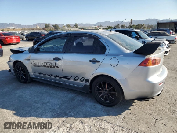 2009 Mitsubishi Lancer DE with VIN JA3AU16U49U002007, listed as a Copart auction lot 70722184 with 152,607 mi miles and Salvage Title. Bid and sale history available at carsss.com. Image 2.