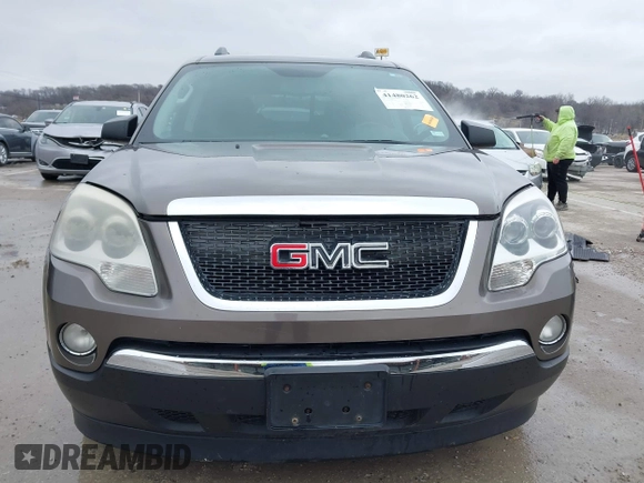 2011 GMC Acadia SL with VIN 1GKKRNED3BJ141640, listed as a IAAI auction lot 41480262 with 164,689 mi miles and . Bid and sale history available at carsss.com. Image 13.