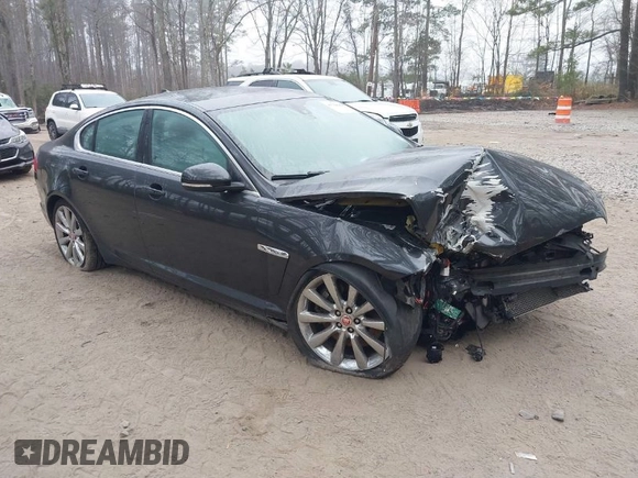 2014 Jaguar XF V6 SC with VIN SAJWJ0EF9E8U12853, listed as a IAAI auction lot 41780409 with 138,329 mi miles. Bid and sale history available at carsss.com. Image 1.