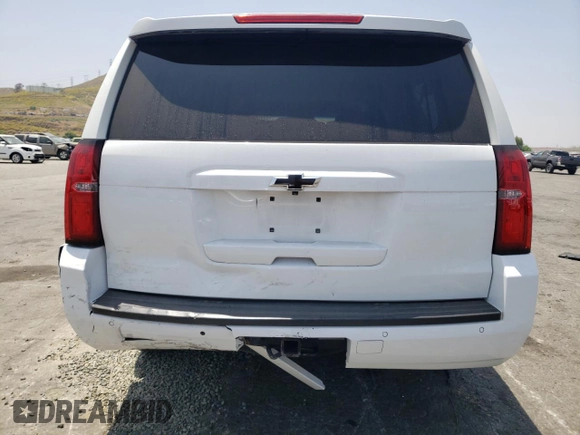 2019 Chevrolet Suburban LT with VIN 1GNSCHKCXKR207233, listed as a Copart auction lot 55410464 with 107,500 mi miles and Salvage Title. Bid and sale history available at DreamBid. Image 6.