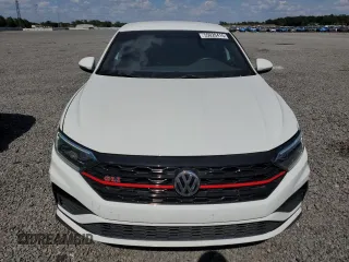 2021 Volkswagen Jetta GLI S z VIN 3VW6T7BU7MM021776, wystawiony jako Copart lot #55020415 z przebiegiem 61 456 mil mil oraz Nie do naprawy. Historia ofert i sprzedaży dostępna na DreamBid. Obrazek 5.