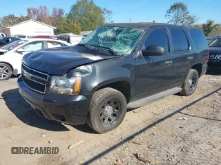 2013 Chevrolet Tahoe Commercial with VIN 1GNLC2E05DR266048, listed as a IAAI auction lot 40848505 with 95,459 mi miles and . Bid and sale history available at DreamBid. Image 2.