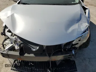 2019 Toyota Corolla L z VIN 5YFBURHE9KP886460, wystawiony jako Copart lot #54403735 z przebiegiem 118 582 mil mil oraz Szkoda całkowita • Salvage title. Historia ofert i sprzedaży dostępna na DreamBid. Obrazek 11.