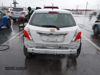 2014 Toyota Yaris L with VIN JTDJTUD34ED576939, listed as a IAAI auction lot 41805971 with 234,406 mi miles. Bid and sale history available at carsss.com. Image 6.