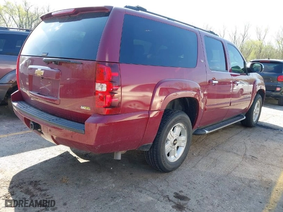 2007 Chevrolet Suburban LTZ with VIN 3GNFK163X7G259264, listed as a IAAI auction lot 42019421 with 130,744 mi miles. Bid and sale history available at carsss.com. Image 4.