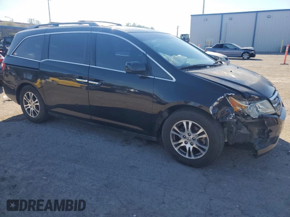 2012 Honda Odyssey EX-L with VIN 5FNRL5H64CB052869, listed as a Copart auction lot 47685375 with 168,449 mi miles and Salvage Title. Bid and sale history available at DreamBid. Image 4.