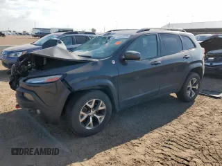 2016 Jeep Cherokee Trailhawk z VIN 1C4PJMBS7GW278421, wystawiony jako Copart lot #63515575 z przebiegiem 125 018 mil mil oraz Szkoda całkowita • Salvage title. Historia ofert i sprzedaży dostępna na DreamBid. Obrazek 1.
