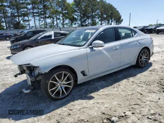 2022 Genesis G70 2.0T z VIN KMTG34TA0NU089619, wystawiony jako Copart lot #52154495 z przebiegiem 70 890 mil mil oraz Szkody całkowita. Historia ofert i sprzedaży dostępna na DreamBid. Obrazek 1.
