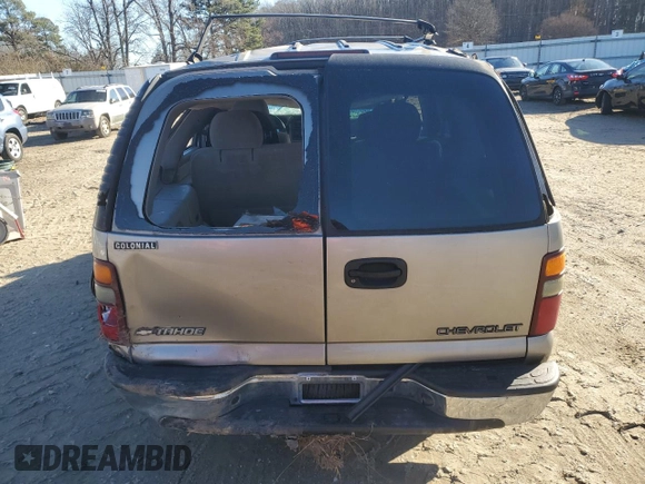 2002 Chevrolet Tahoe LS z VIN 1GNEC13Z62R242388, wystawiony jako Copart lot #86362454 z przebiegiem Nie podano mil oraz Nie do naprawy • Non repairable. Historia ofert i sprzedaży dostępna na DreamBid. Obrazek 6.