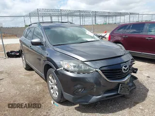 2015 Mazda CX-9 Touring with VIN JM3TB2CA7F0460232, listed as a IAAI auction lot 42344122 with 103,478 mi miles and . Bid and sale history available at DreamBid. Image 1.