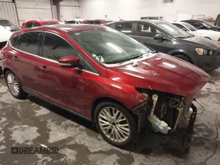 2017 Ford Focus Titanium with VIN 1FADP3N24HL320589, listed as a IAAI auction lot 41618322 with 81,722 mi miles and . Bid and sale history available at carsss.com. Image 1.