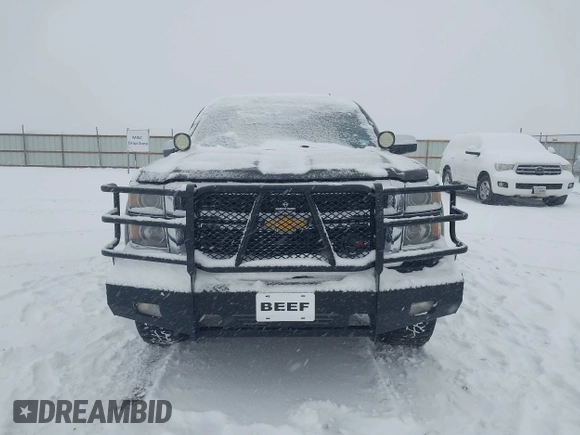 2014 Chevrolet Silverado 1500 LTZ with VIN 3GCUKSEC5EG291026, listed as a IAAI auction lot 41286574 with 124,615 mi miles and . Bid and sale history available at DreamBid. Image 12.
