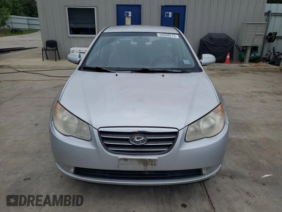 2007 Hyundai Elantra GLS z VIN KMHDU46D77U229572, wystawiony jako Copart lot #56008515 z przebiegiem 75 374 mil mil oraz Szkoda całkowita • Salvage title. Historia ofert i sprzedaży dostępna na DreamBid. Obrazek 5.