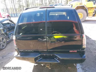 2000 GMC Denali with VIN 1GKEK13R1YR129862, listed as a IAAI auction lot 41833054 with 223,811 mi miles. Bid and sale history available at carsss.com. Image 16.