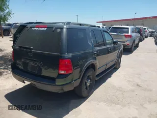 2002 Ford Explorer XLT z VIN 1FMZU63WX2ZC13479, wystawiony jako IAAI lot #42793555 z przebiegiem 206 581 mil mil oraz . Historia ofert i sprzedaży dostępna na DreamBid. Obrazek 4.