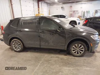 2019 Volkswagen Tiguan S with VIN 3VV0B7AX3KM182311, listed as a IAAI auction lot 41727114 with 98,035 mi miles and . Bid and sale history available at DreamBid. Image 13.