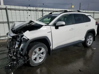 2021 Toyota RAV4 Hybrid XLE with VIN JTMRWRFV2MD125397, listed as a Copart auction lot 51694095 with 23,429 mi miles and Salvage Title. Bid and sale history available at carsss.com. Image 1.