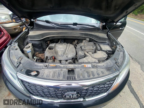 2015 Kia Sorento LX with VIN 5XYKTCA65FG612606, listed as a Copart auction lot 65296225 with Not provided miles and Clean title. Bid and sale history available at DreamBid. Image 7.