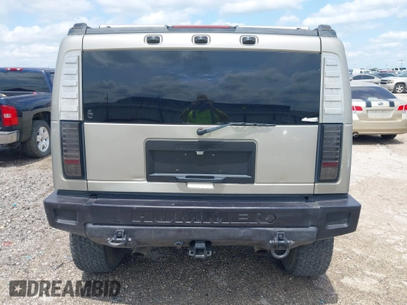 2003 Hummer H2 with VIN 5GRGN23U23H148326, listed as a IAAI auction lot 42068326 with 149,396 mi miles. Bid and sale history available at carsss.com. Image 16.