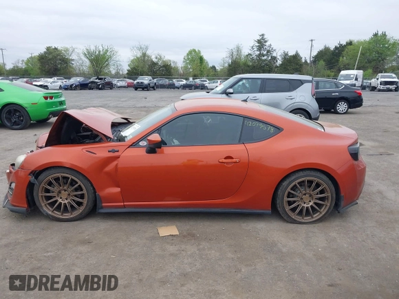 2014 Scion FR-S z VIN JF1ZNAA16E9703911, wystawiony jako IAAI lot #42079578 z przebiegiem 95 754 mil mil oraz . Historia ofert i sprzedaży dostępna na DreamBid. Obrazek 14.