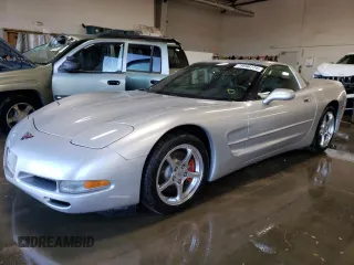 2002 Chevrolet Corvette with VIN 1G1YY22G825115140, listed as a Copart auction lot 79898774 with 64,214 mi miles and Salvage Title. Bid and sale history available at carsss.com. Image 1.