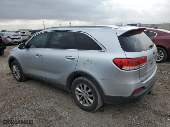 2016 Kia Sorento LX with VIN 5XYPG4A56GG122023, listed as a Copart auction lot 47386125 with 128,504 mi miles and Salvage Title. Bid and sale history available at carsss.com. Image 2.