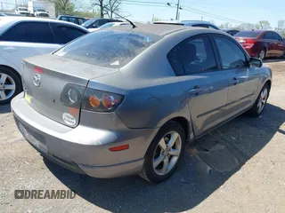 2006 Mazda 3 s Grand Touring with VIN JM1BK323261410457, listed as a IAAI auction lot 42057678 with 203,872 mi miles. Bid and sale history available at carsss.com. Image 4.