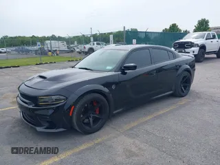 2020 Dodge Charger SRT Hellcat z VIN 2C3CDXL9XLH134202, wystawiony jako IAAI lot #42402856 z przebiegiem 24 675 mil mil oraz . Historia ofert i sprzedaży dostępna na DreamBid. Obrazek 17.