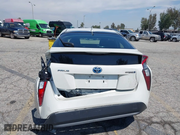 2016 Toyota Prius Four with VIN JTDKARFUXG3511034, listed as a IAAI auction lot 42137394 with 77,424 mi miles. Bid and sale history available at carsss.com. Image 16.