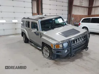 2006 Hummer H3 with VIN 5GTDN136268123052, listed as a IAAI auction lot 42126283 with 124,040 mi miles. Bid and sale history available at carsss.com. Image 1.