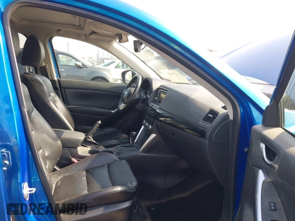 2014 Mazda CX-5 Grand Touring with VIN JM3KE4DY1E0327703, listed as a IAAI auction lot 41755735 with 206,845 mi miles. Bid and sale history available at carsss.com. Image 5.