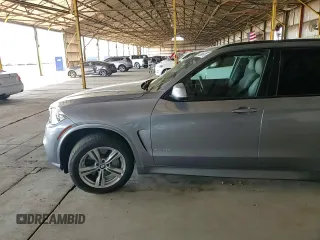 2014 BMW X5 xDrive50i z VIN 5UXKR6C57E0J71844, wystawiony jako Copart lot #54399675 z przebiegiem 79 898 mil mil oraz Szkoda całkowita • Salvage title. Historia ofert i sprzedaży dostępna na DreamBid. Obrazek 14.