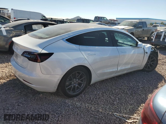 2020 Tesla Model 3 Standard Range Plus with VIN 5YJ3E1EA4LF799597, listed as a Copart auction lot 76401374 with 77,506 mi miles and Salvage Title. Bid and sale history available at DreamBid. Image 3.
