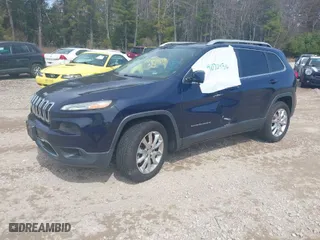 2015 Jeep Cherokee Limited with VIN 1C4PJMDS6FW674657, listed as a IAAI auction lot 41070436 with 103,814 mi miles. Bid and sale history available at carsss.com. Image 2.