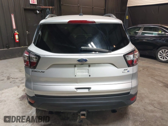 2018 Ford Escape SE z VIN 1FMCU9GD0JUD33111, wystawiony jako IAAI lot #42277404 z przebiegiem 71 896 mil mil oraz . Historia ofert i sprzedaży dostępna na DreamBid. Obrazek 16.