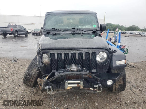 2020 Jeep Wrangler Sport S with VIN 1C4GJXAN7LW343890, listed as a Copart auction lot 63363335 with 74,179 mi miles and Salvage title. Bid and sale history available at DreamBid. Image 5.