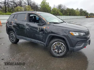 2024 Jeep Compass Trailhawk with VIN 3C4NJDDN6RT104623, listed as a Copart auction lot 57217045 with 15,306 mi miles and Salvage title. Bid and sale history available at DreamBid. Image 4.
