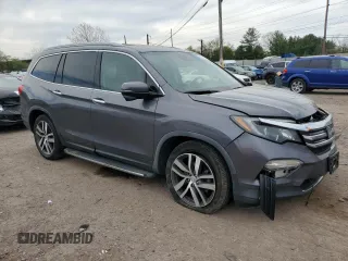 2017 Honda Pilot Touring with VIN 5FNYF5H97HB039702, listed as a Copart auction lot 54046145 with 149,050 mi miles and Salvage Title. Bid and sale history available at carsss.com. Image 4.