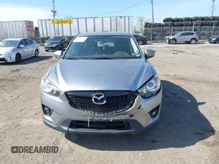 2014 Mazda CX-5 Grand Touring with VIN JM3KE4DY7E0311893, listed as a IAAI auction lot 42090872 with 102,154 mi miles and . Bid and sale history available at DreamBid. Image 6.