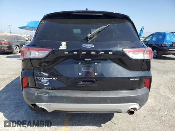 2021 Ford Escape Titanium with VIN 1FMCU9J93MUA54213, listed as a Copart auction lot 59211045 with Not provided miles and Salvage title. Bid and sale history available at DreamBid. Image 6.
